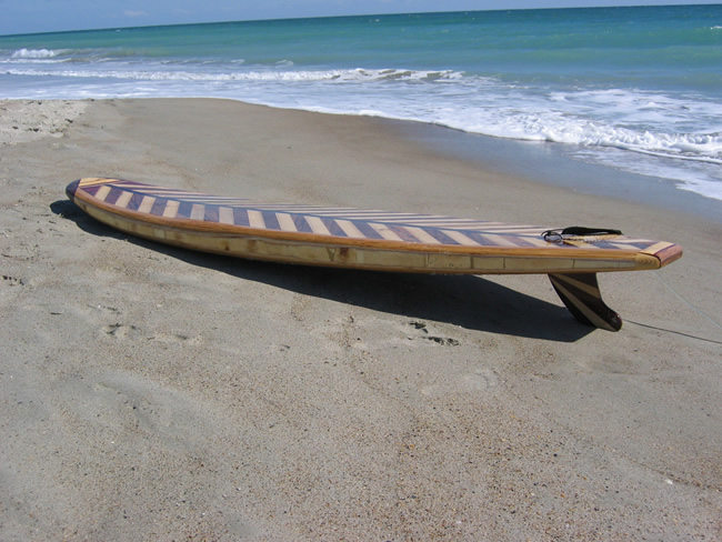 wooden hollow surfboard
